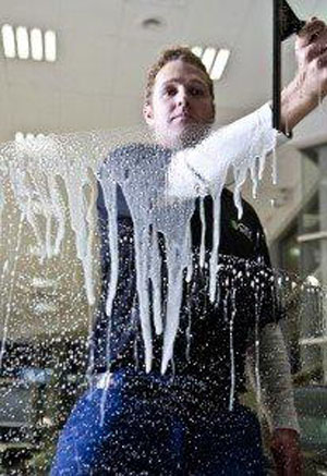 A Man cleaning a window