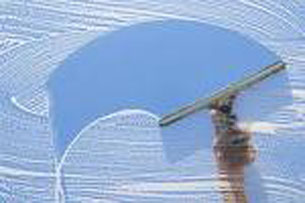 A Man cleaning a window